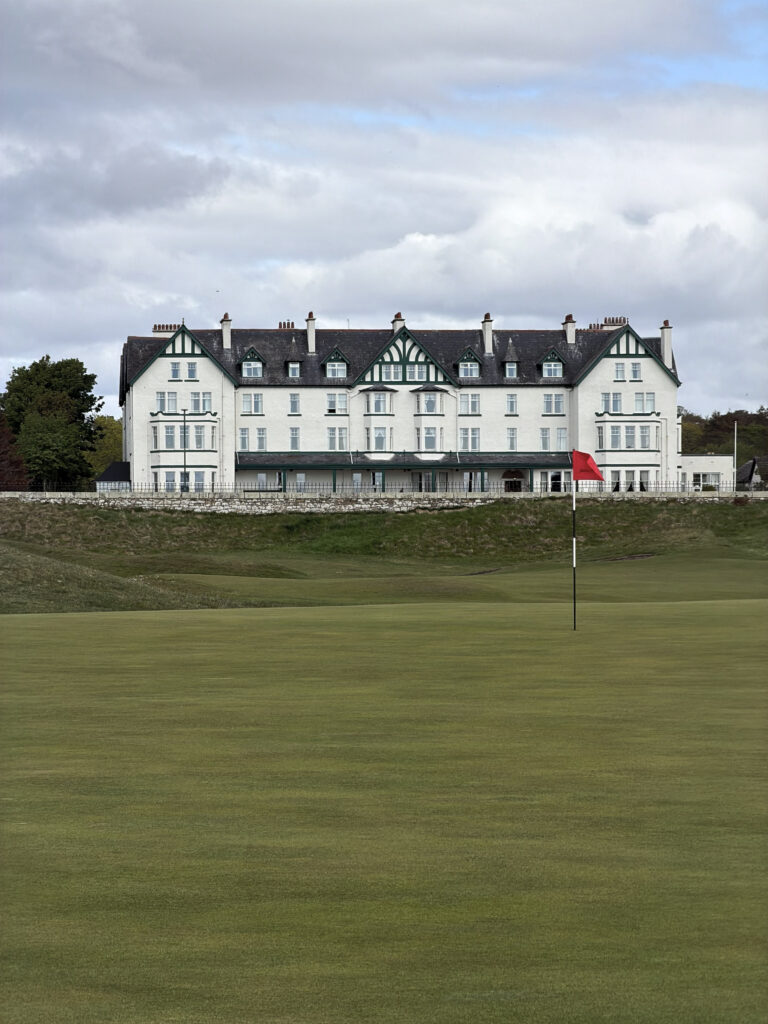 View of Marine & Lawn Dornoch, the former Dornoch Station hotel, from the first green of Royal Dornoch