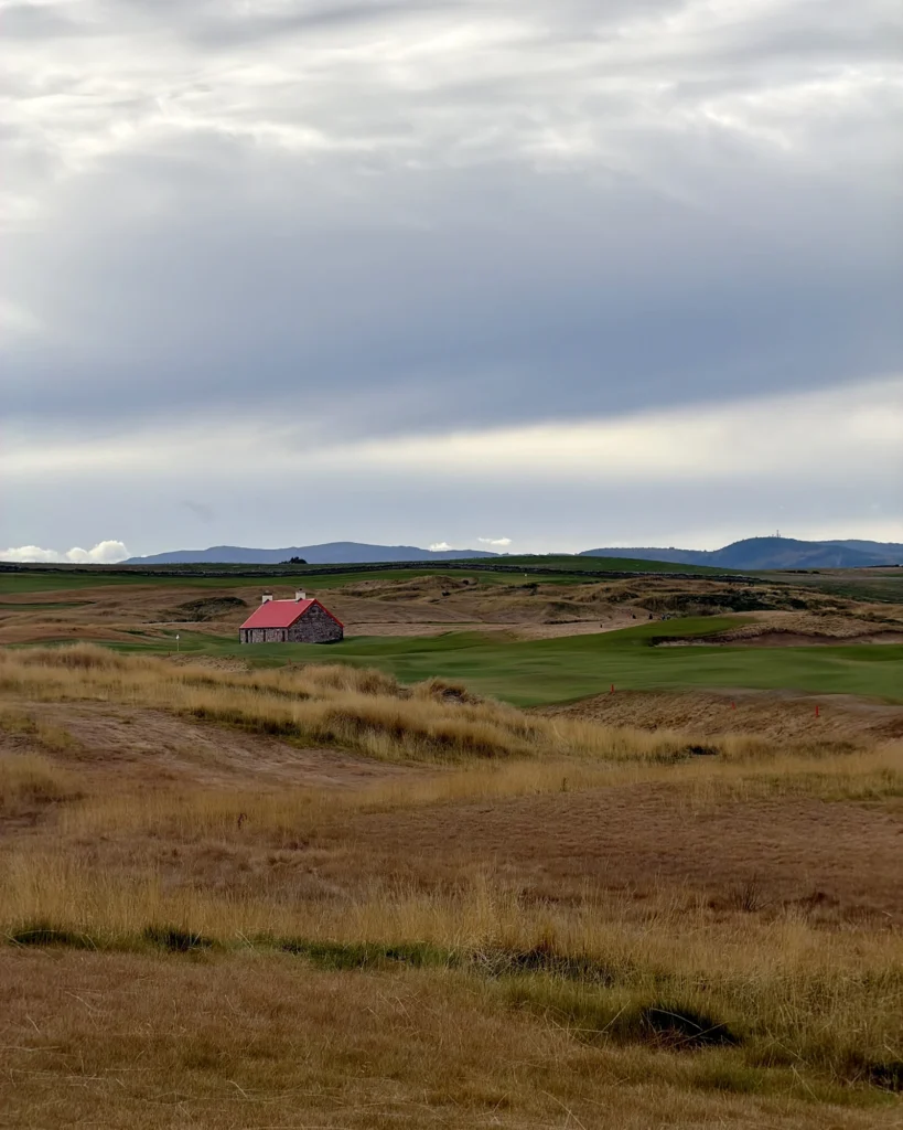 The 5th hole at Old Petty, Cabot Highlands, with the hut beside the fairway
